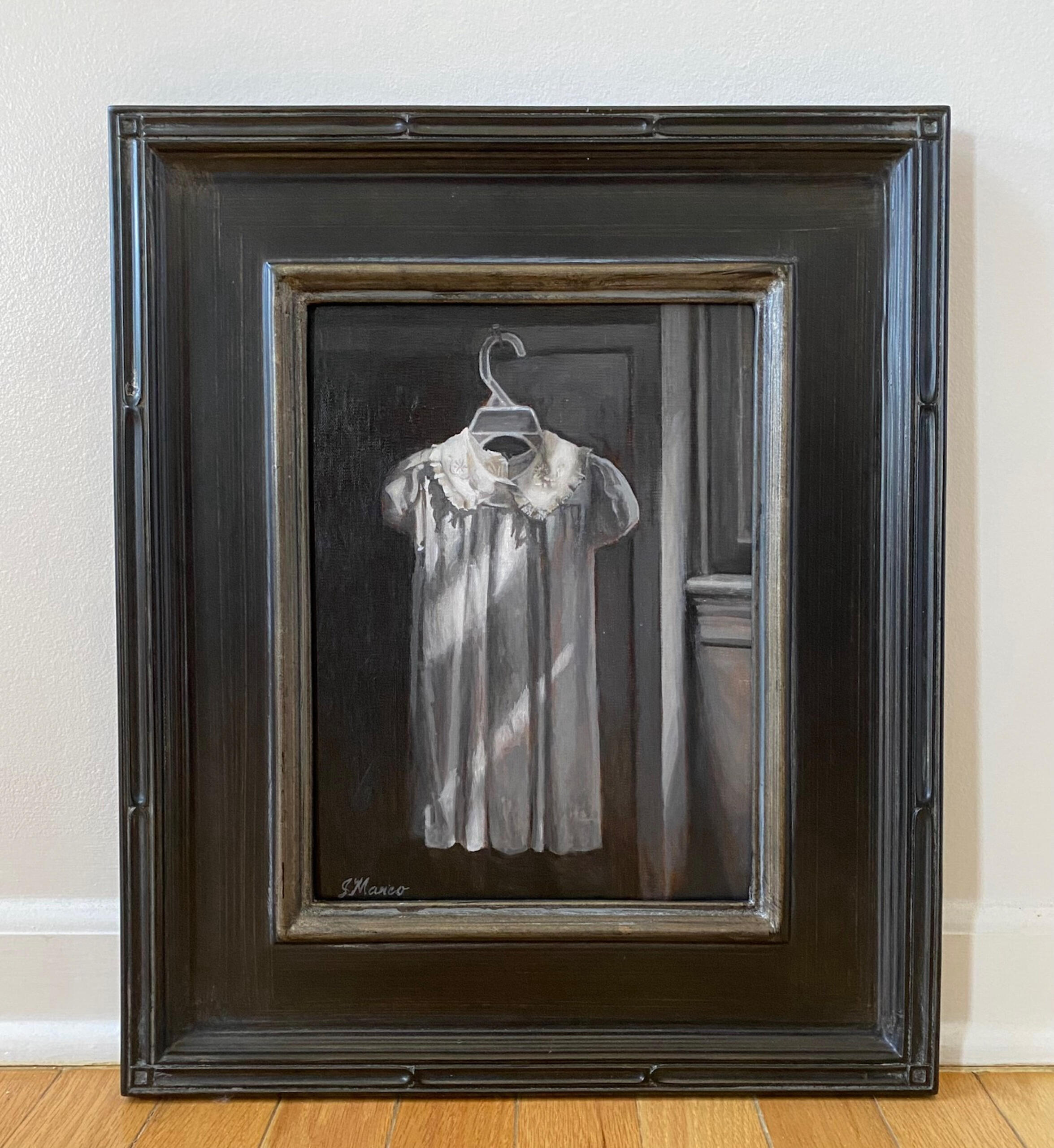 "Heirloom" by Jane Manco in a worn black frame with a worn yellow interior edge.